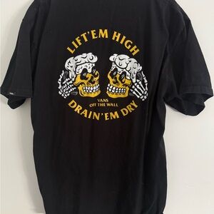 Vans Black Short-Sleeve Graphic Tee with Yellow & White Skull Design